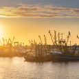 Sunset landscape of Dutch harbor Lauwersoog with fishing ships long the Waddensea in Groningen the Netherlands