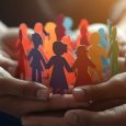 Diversity Inclusion And Equality Concept With Colorful Paper People Silhouettes On Supporting Hands