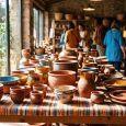 Artisanal Pottery And Ceramic Bowls Displayed At A Local Market For Fair Trade And Handmade Crafts
