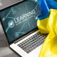 laptop near ukraine flag. Learn english concept. .