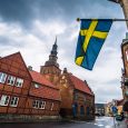 Ystad - October 22, 2017: Swedish national flag at the historic center of the town of Ystad in Skane, Sweden