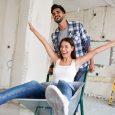 Loving couple is having fun while they are renovating home